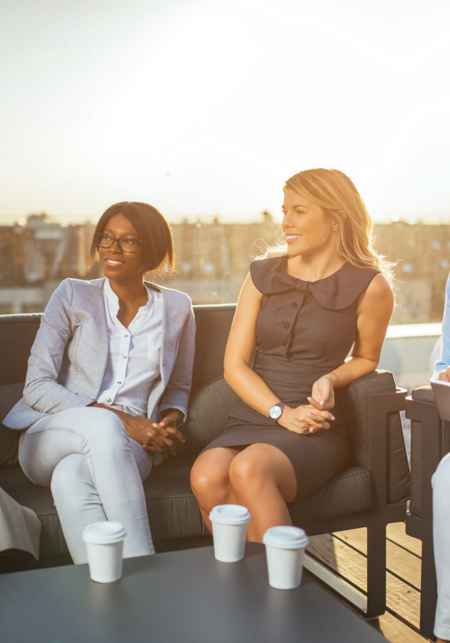 Female business owners meeting outside